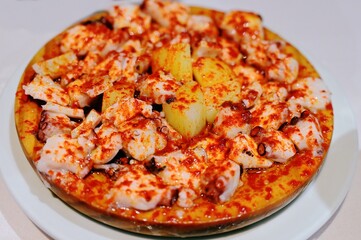 Galician-style octopus with potatoes and paprika © TakuyaSalam