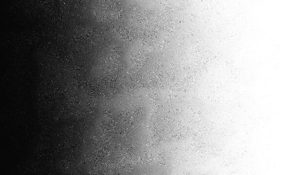 Background with grain or noise, stipple or grunge effect. Monochrome gritty pattern. Distressed, mezzotint or splatter texture. Grey gradient print