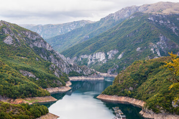 Piv Lake in Montenegro. A lake with turquoise water among high mountains © tillottama