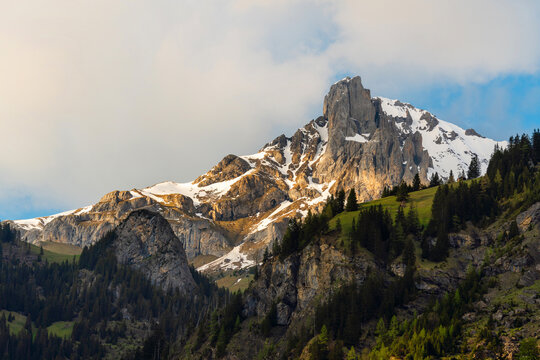 Panoramic mountains with snow and sunlight in the morning