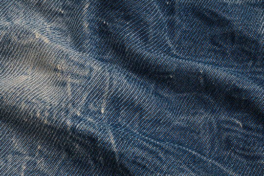 Worn Blue Denim Fabric Texture Background