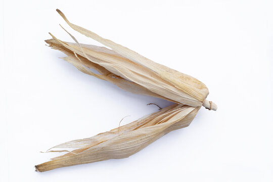 Dried corn husks isolated on white background for handicraft material, Dry maize husks group isolated on white background for traditional handmade craft