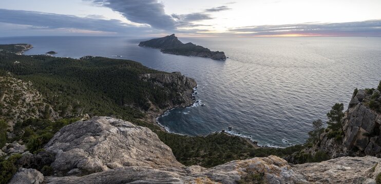Panorama, rocky coast with an island, sunset over the sea, Mirador Jose Sastre, Sa Dragenora Island, Majorca, Spain