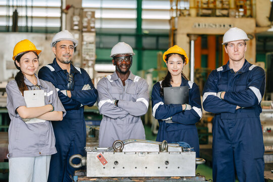 Group of Engineer Team, Diversity Industry Workers Teamwork Standing Together Training at Steel Mold