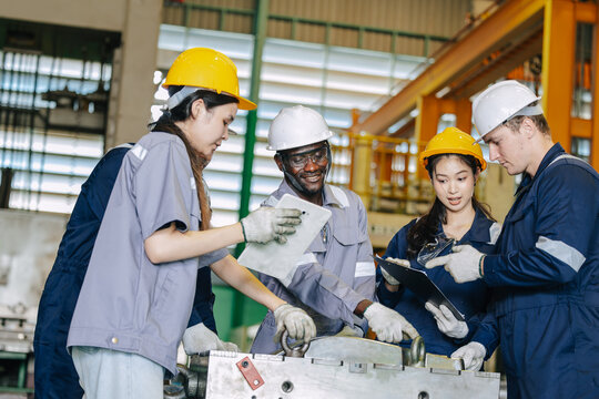 Group of Engineer Team, Diversity Industry Workers Teamwork Working Together Training at Steel Mold