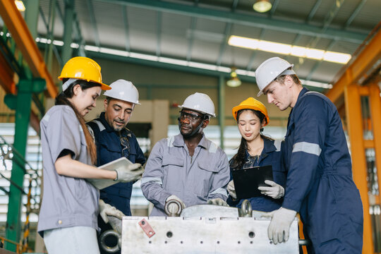 Group of Engineer Team, Diversity Industry Workers Teamwork Working Together Training at Steel Mold