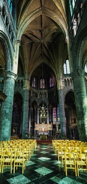 Photograph of the seating arrangement in front of the altar of the church in Dinant, Belgium.