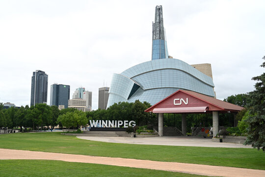 Winnipeg, Manitoba, Canada - July 2, 2026: Winnipeg Sign and  Canadian Museum for Human Rights in the background, Winnipeg, Manitoba.