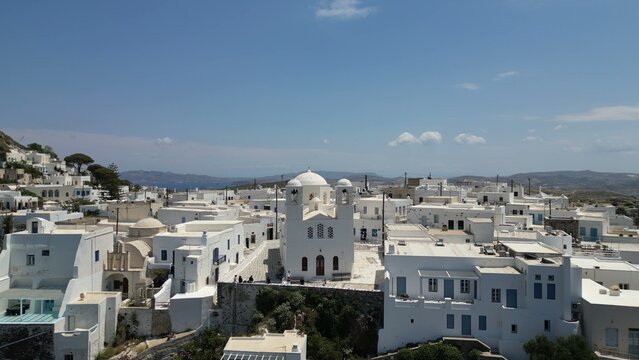 Aerial of Church Domes and Rooftops in Plaka Village Milos