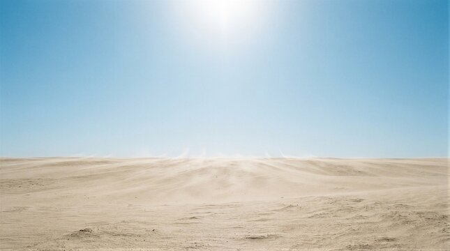 Vast desert stretches under a bright, clear sky. Sunlight glows intensely overhead, casting soft shadows. Wind stirs fine sand across the endless plain