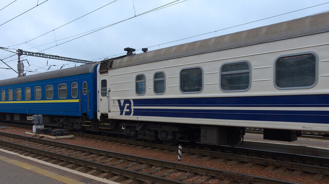 Kyiv, Ukraine, February 25, 2020. Ukrzaliznytsia train carriages on a railway platform. Ukrainian passenger railway carriage.