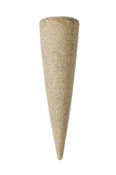 Single conical shaped sand-colored object with a rough, granular texture stands vertically on a clean white background