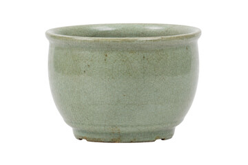 Antique celadon ceramic tea cup with a delicate crackled glaze texture, captured on a clean white background © Chinases