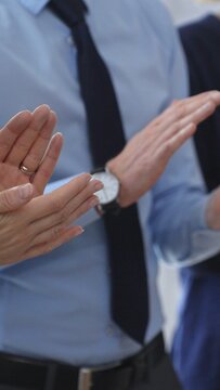 Business audience hands clapping, showing appreciation and success in a corporate meeting, celebrating achievement and positive feedback at a professional event