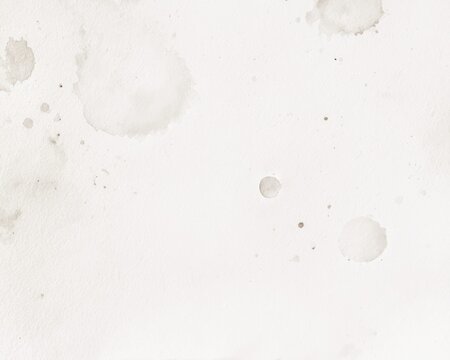 Textured light background with subtle stains and spots