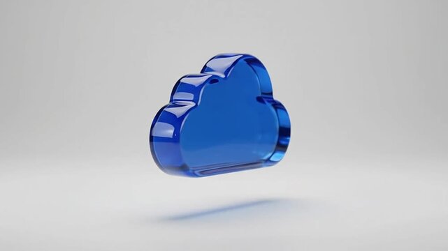 Glossy blue cloud shape rotating against a white studio background representing data storage and cloud computing technology concepts