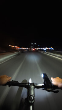 POV Cycling on City Road at Night