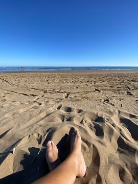feet on the beach