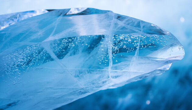 青い氷の塊に無数の気泡が閉じ込められた透明感のある背景