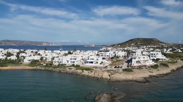 Aerial View Of Pollonia Village On Rocky Coastline, Milos, Greece