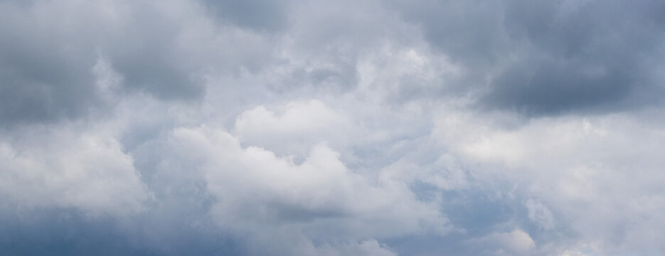 Thick gray clouds in sky before storm