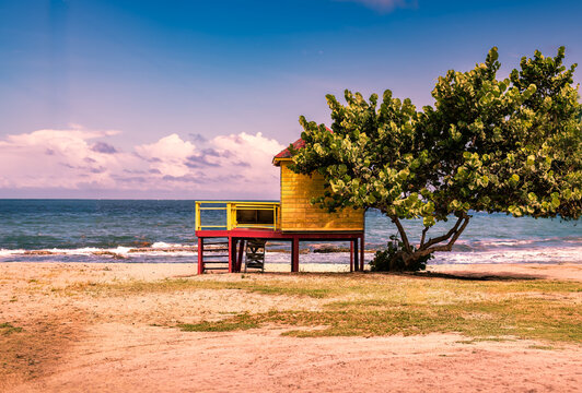 Lifeguard station on Bathway Beach Grenada., waves breaking on shore.