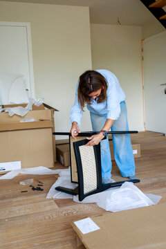 Person Builds Furniture at Home