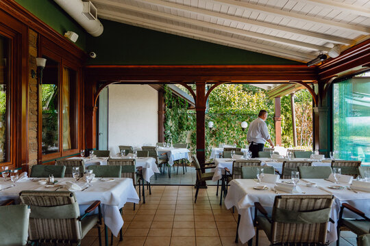 Empty Restaurant Dining Room Prepared for Service