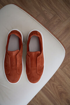 New shoes placed on a light colored surface