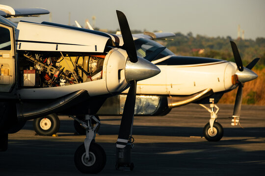 Small Propeller Plane Engine Detail at Sunrise