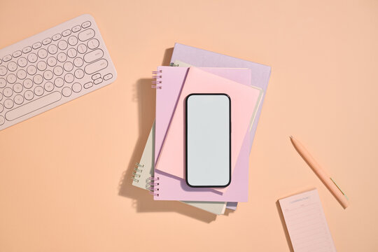 Workspace with a smartphone and stationary