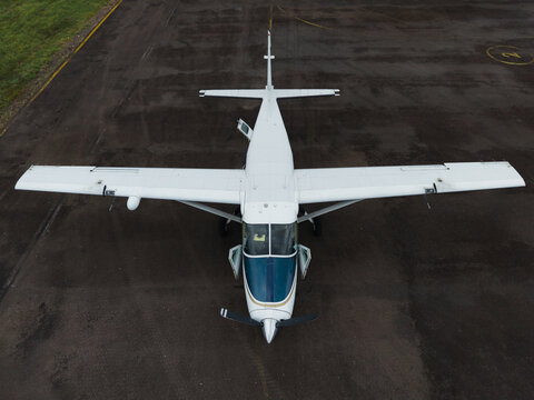 Small Turboprop Plane Parked On Tarmac