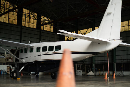 Turboprop Aircraft Parked Inside Hangar