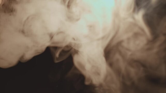 clubs of white smoke on pastel background. Beautiful abstract background. Bright smoke texture. Pattern. Light, white, fog, cloud, black, 4k, ice cloud. Floating Cigarette smoke in air
