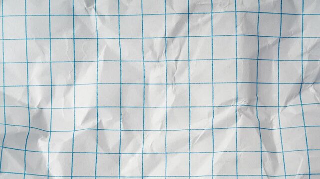 Checkered paper notebook background loop. Crumpled square math sheet pattern, white grid note book bg, abstract notepad paper, blank copybook