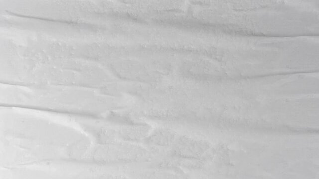 White crumpled paper background loop, blank wrinkled sheet. Old crumpled paper texture for vintage poster, creased note sheet mockup