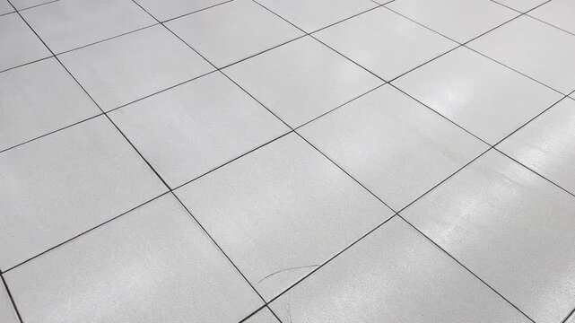 Clean white ceramic floor tiles grid texture background
