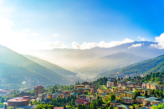 Thimphu City view point of Bhutan SEP 2026, Scenic mountain valley town bathed in morning sunlight under blue sky