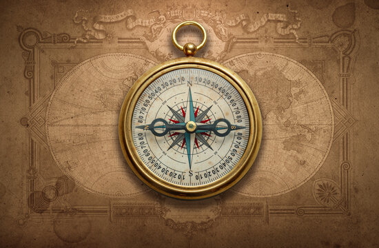 Magnetic old compass on world map. Travel, geography, history, navigation, tourism and exploration concept background. Retro compass on geography map.