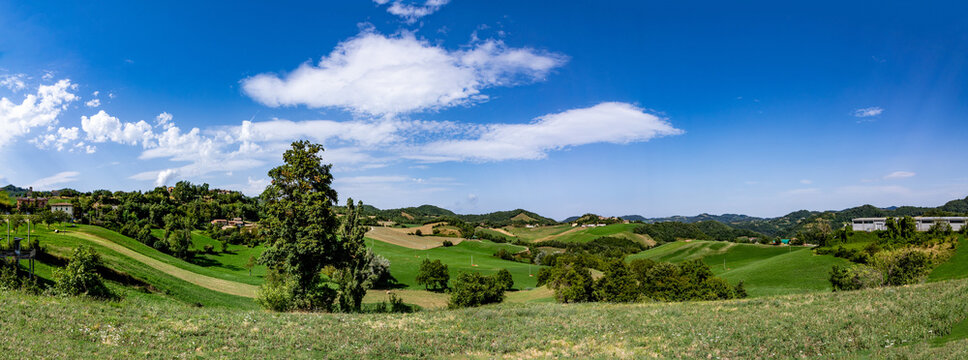 view from Castelnovo ne' Monti  to the scenic hilly landscape in the continental Apennines province Regio Emilia in the Umbria-Marche Apennines, Italy.