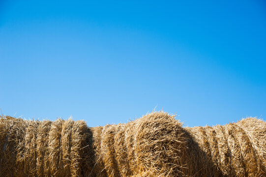 Storage with piles of stacks of hay
