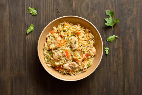 Pilaf with chicken meat, onion, carrots and basmati rice