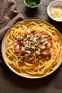 Spaghetti pasta dish with meaty tomato sauce, made with beef and pork, onions, tomato, and herbs