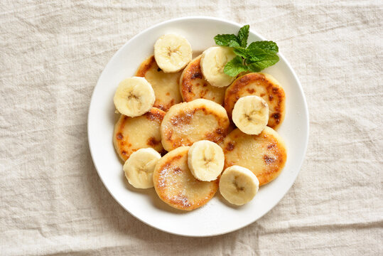 Delicious cottage cheese pancakes with banana slices