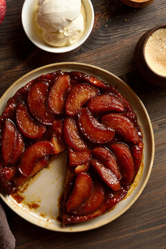 Apple tarte Tatin with sweet caramelized red apples and sugar caramel served with ice cream