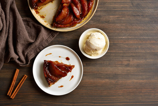 Apple tarte Tatin with sweet caramelized red apples and sugar caramel served with ice cream