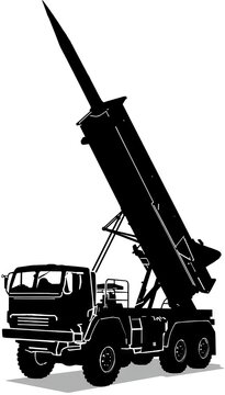 Military truck with raised missile launcher ready for firing