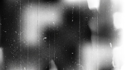 Obraz premium Old film texture with scratches, noise and light leaks. Realistic transparent overlay film texture in black-white, dust and grain. Distressed retro movie or photo negative effect of cinema nostalgia