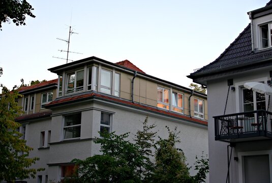 Apartment buildings with dormer windows and balcony
