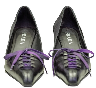Prada pumps in black leather with an aged finish and purple laces from the autumn/winter collection. Milan &ndash; Italy, 27 September 2026